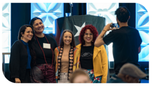 Four scholars posing for a picture at Summer Institute.