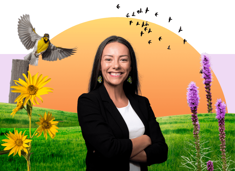 Scholar Melissa Horner smiling with arms crossed and a vibrant collage background. Melissa is wearing a black blazer and white shirt. There is a yellow/orange semi circle behind her and green fields at the bottom. A yellow bird is perched to the left and a flock of birds flies above her. There are yeallow and purple wildflowers.