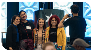 Four scholars posing for a picture at Summer Institute.